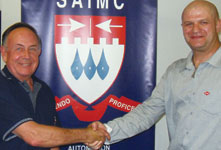 Chairman John Owen Ellis (l) thanks Marius after the presentation.